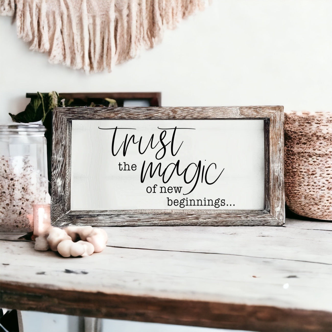 A stylish wooden sign featuring the quote 'Trust in the Magic of New Beginnings', crafted from durable Paulownia wood.