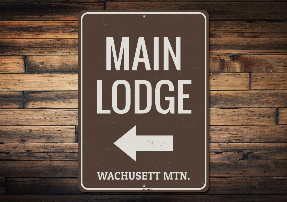 Main Lodge Arrow Sign made of high-quality aluminum, featuring a rustic design perfect for ski enthusiasts.