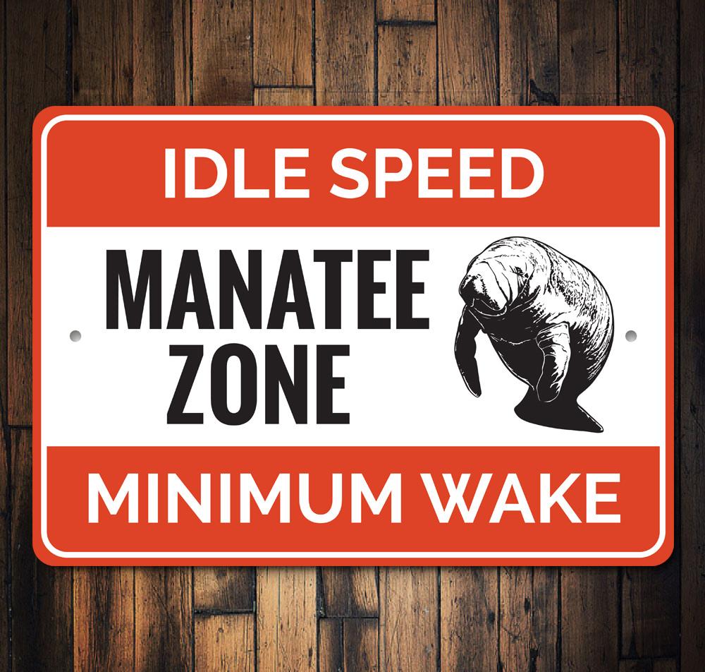 Manatee Zone Sign made of durable aluminum, featuring a beach-themed design, perfect for coastal decor.