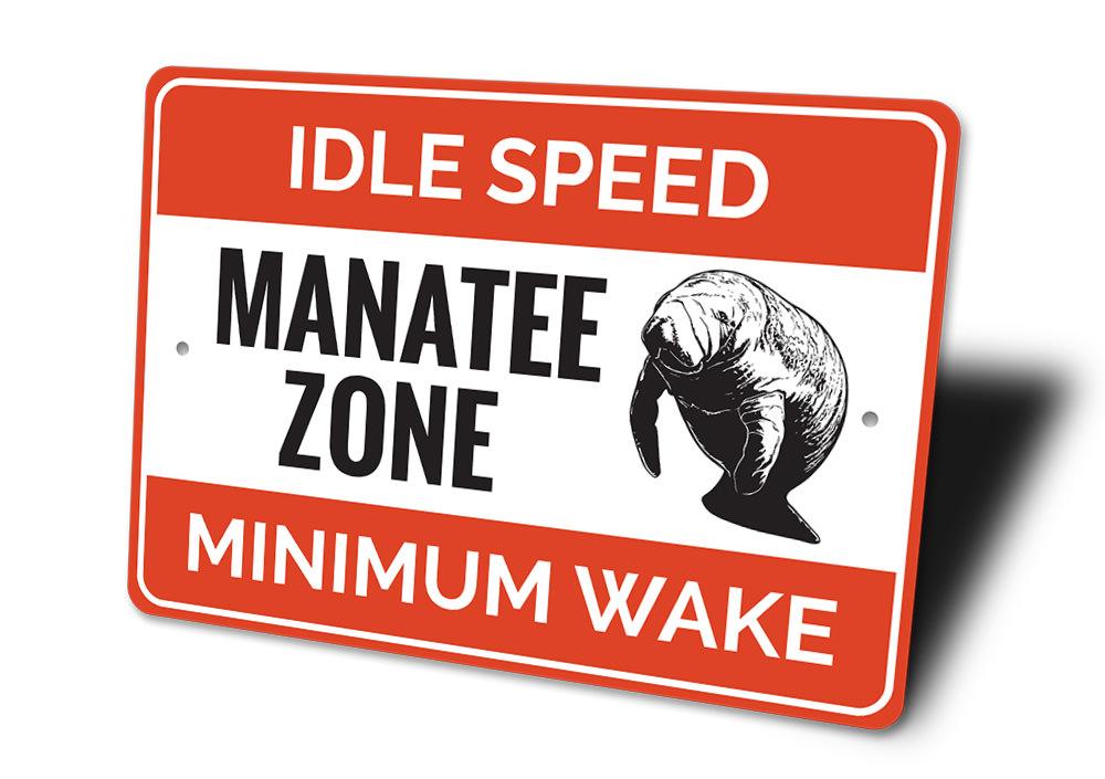 Manatee Zone Sign made of durable aluminum, featuring a beach-themed design, perfect for coastal decor.