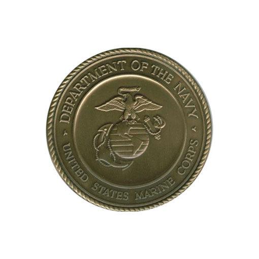 Marine Corps Brass service medallion, 2 1/2 inches in diameter, featuring an antique finish and adhesive backing for easy mounting.