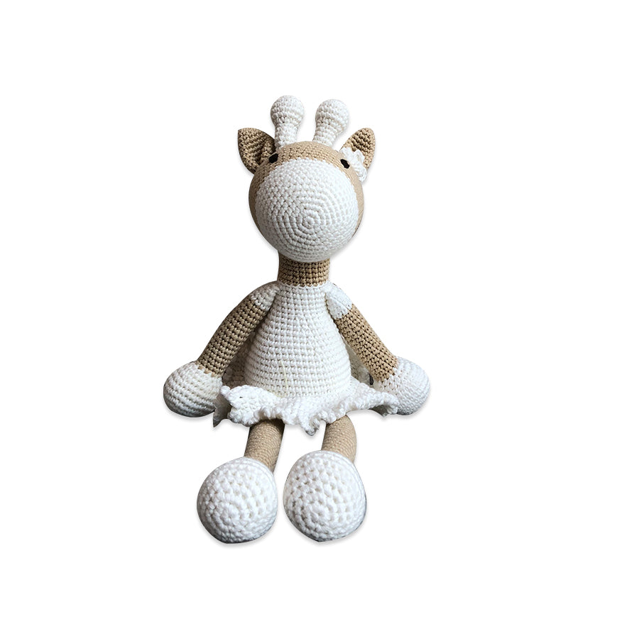 Handmade crochet toy of a deer girl, crafted from 100% cotton yarn, featuring intricate stitching and a soft, cuddly design.