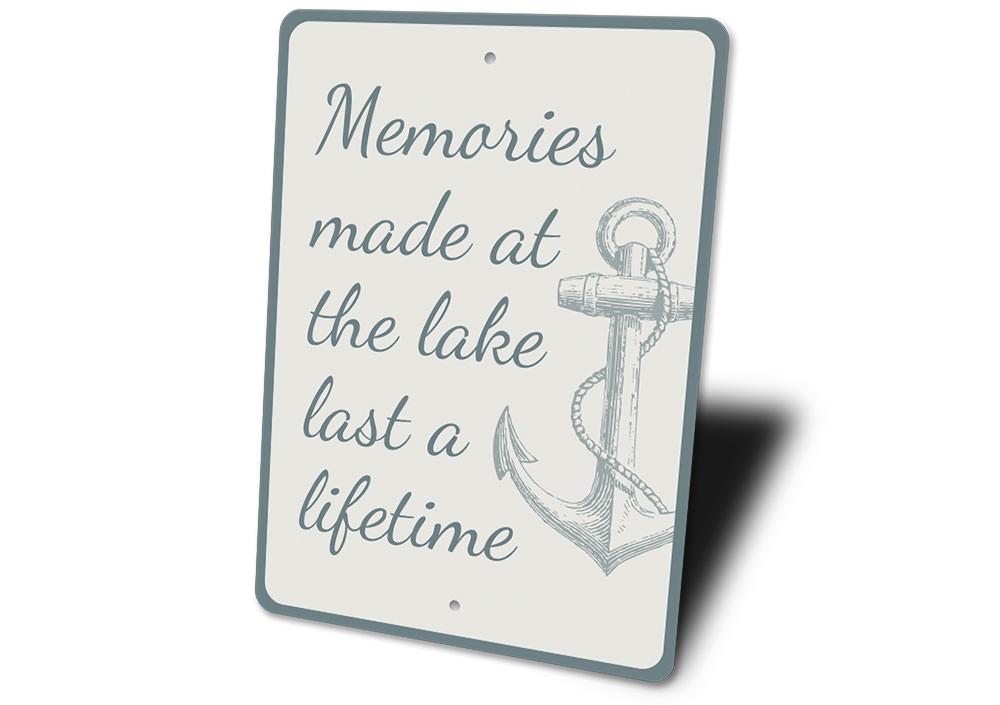 A decorative aluminum sign reading 'Memories Made at the Lake', showcasing a serene lakeside theme, perfect for lakehouse decor.