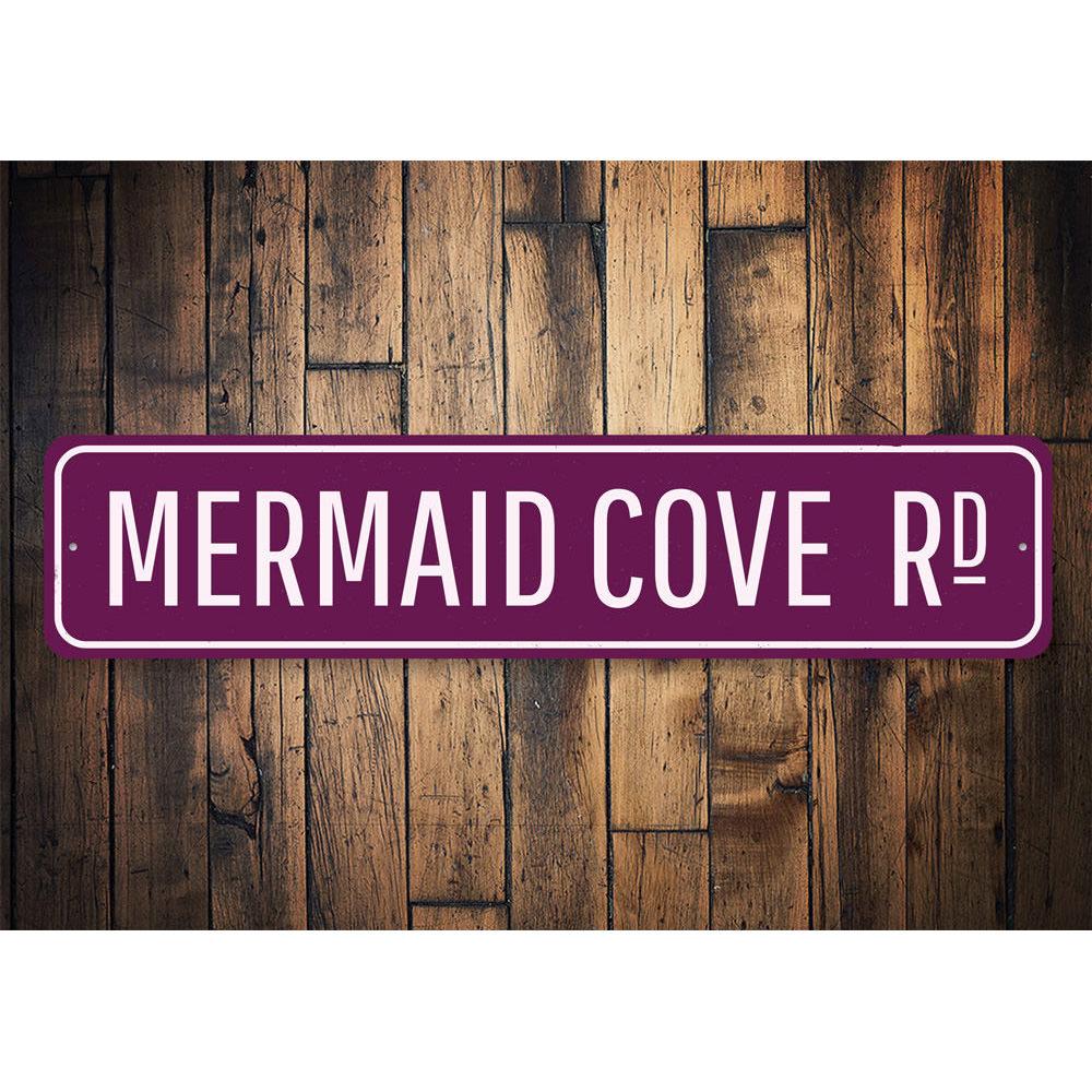 Mermaid Cove Sign featuring vibrant colors and decorative design, perfect for home decor.