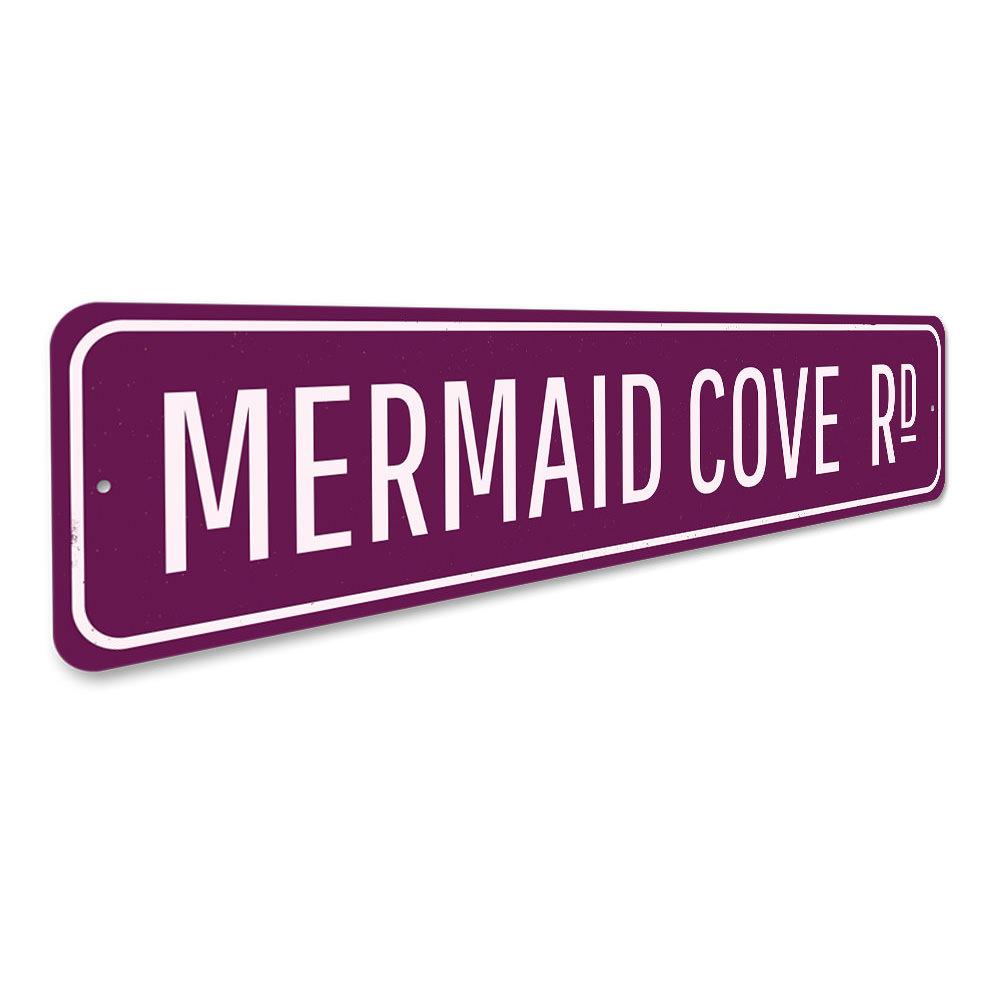 Mermaid Cove Sign featuring vibrant colors and decorative design, perfect for home decor.