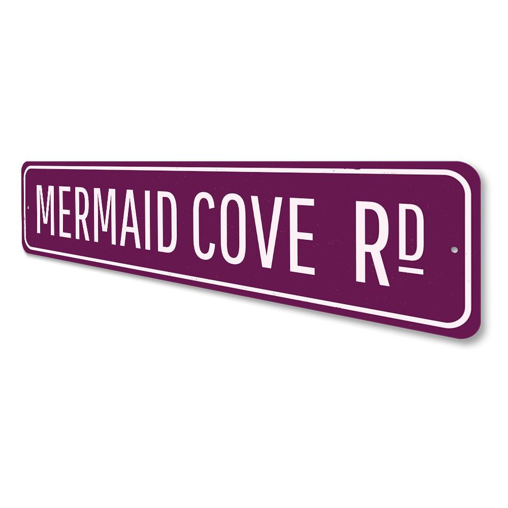 Mermaid Cove Sign featuring vibrant colors and decorative design, perfect for home decor.