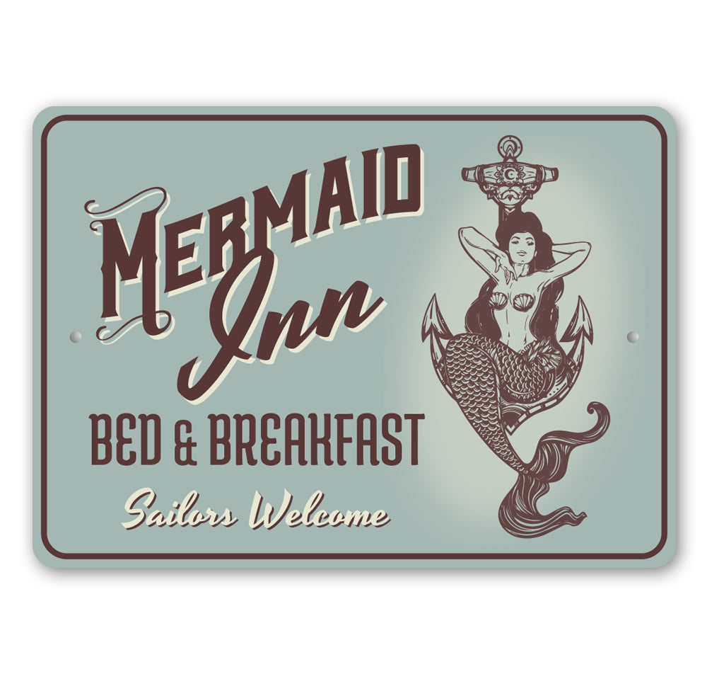 A beautifully crafted Mermaid Inn Sign made of high-quality aluminum, featuring vibrant colors and customizable text, perfect for beach-themed decor.