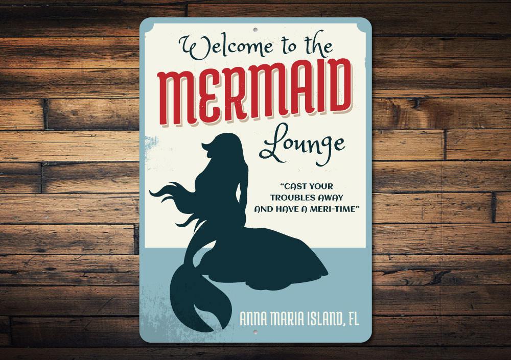 A beautifully crafted Mermaid Lounge Sign made of high-quality aluminum, featuring a beach-themed design perfect for coastal decor.