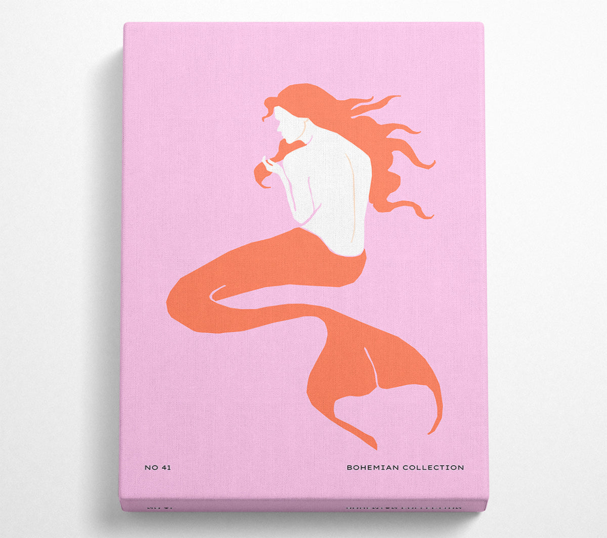 A vibrant artwork featuring a whimsical mermaid on a soft pink background, mounted on a sturdy box frame.