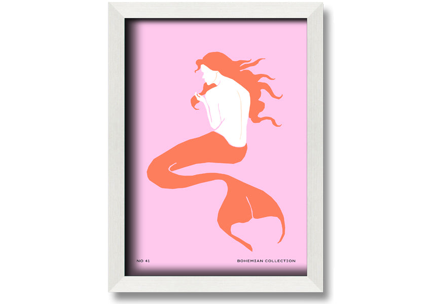 A beautifully illustrated framed print of a mermaid on a soft pink background, showcasing vibrant colors and intricate details.