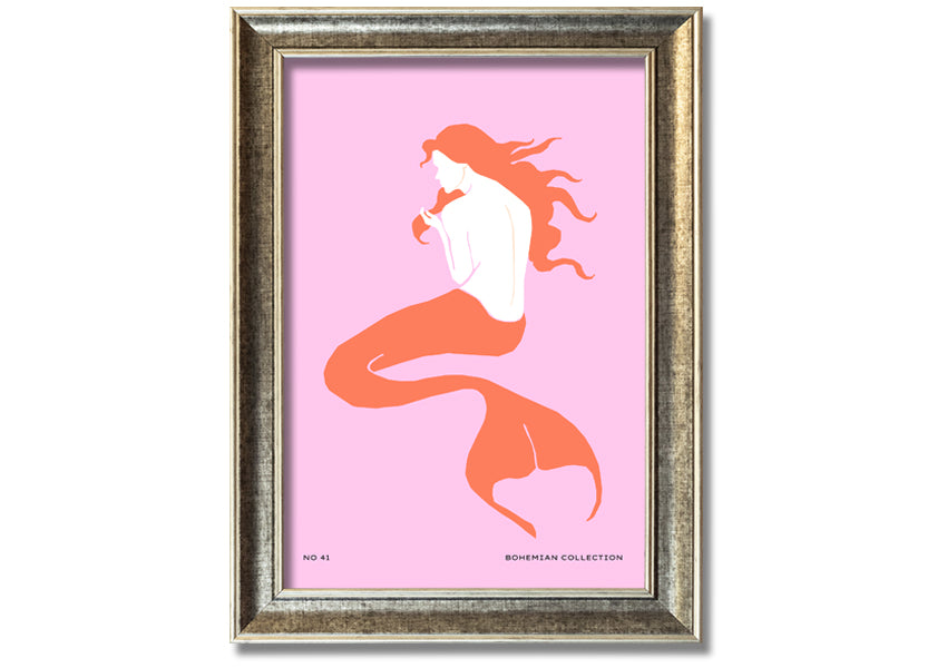 A beautifully illustrated framed print of a mermaid on a soft pink background, showcasing vibrant colors and intricate details.