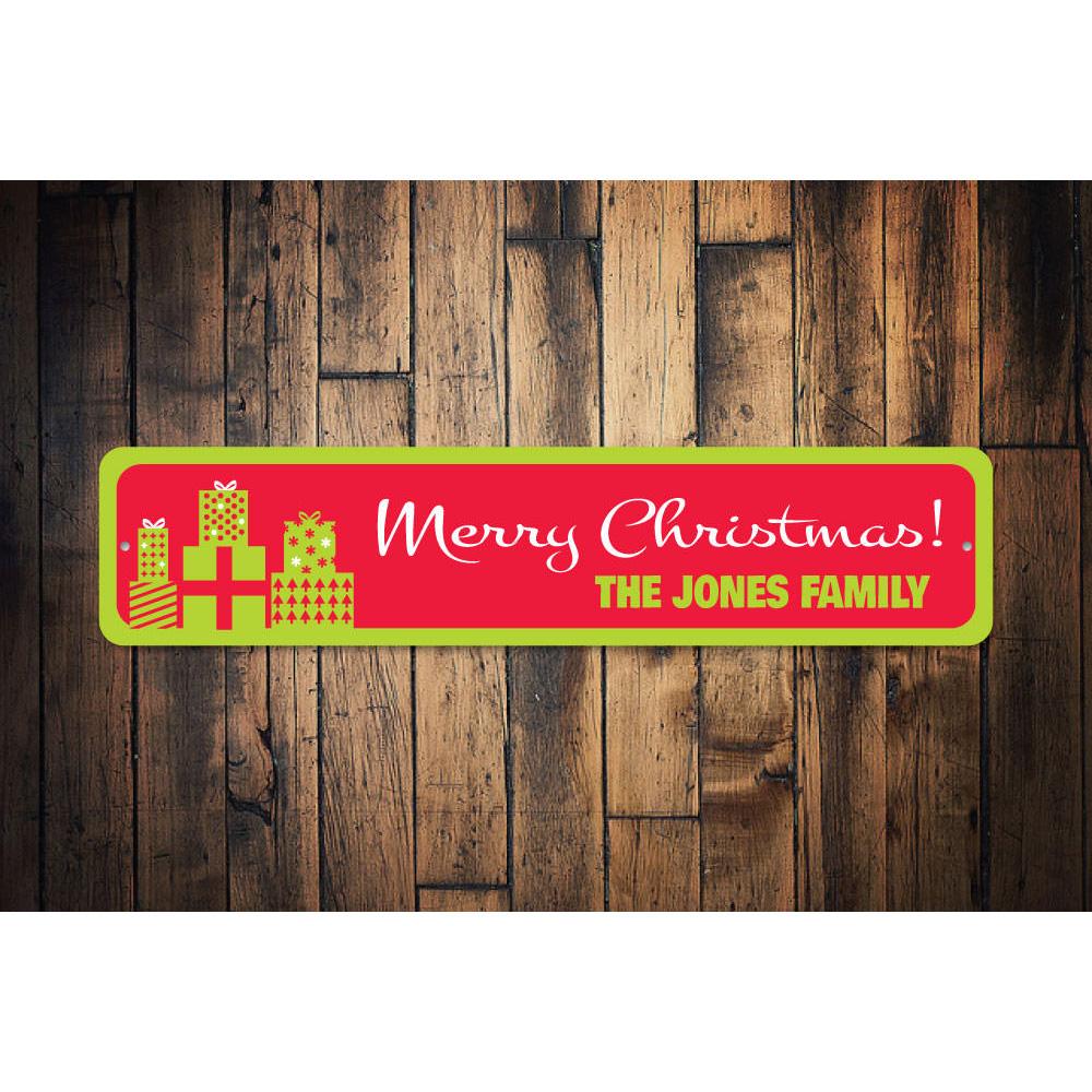 A festive Merry Christmas Gift Sign made of high-quality aluminum, featuring a charming design perfect for holiday decorations.