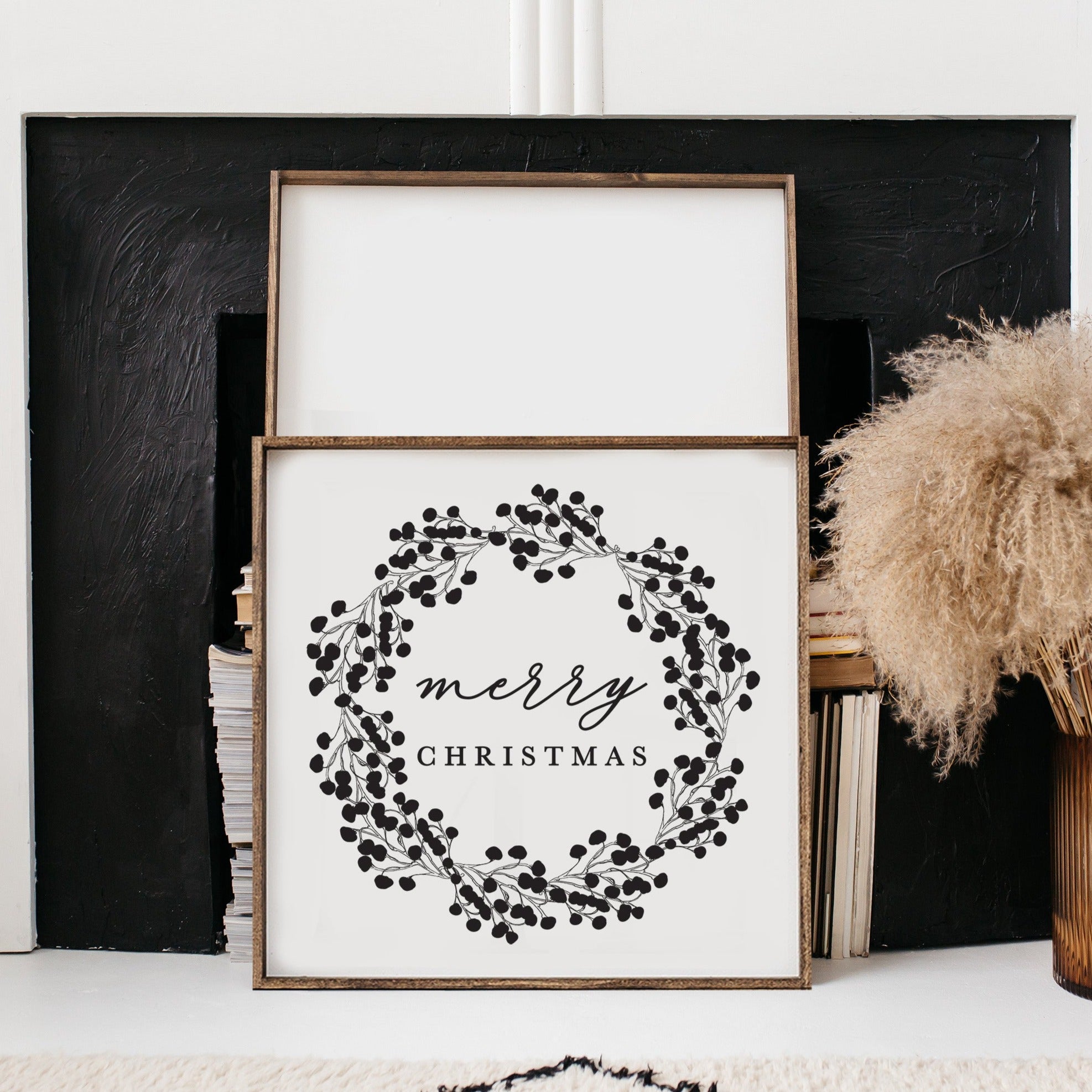 Merry Christmas Wood Sign featuring a detailed wreath design, available in black and white, framed in espresso stained pine.