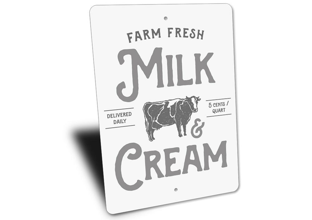 A decorative Milk & Cream Sign made of high-quality aluminum, featuring customizable text options, perfect for kitchen decor.