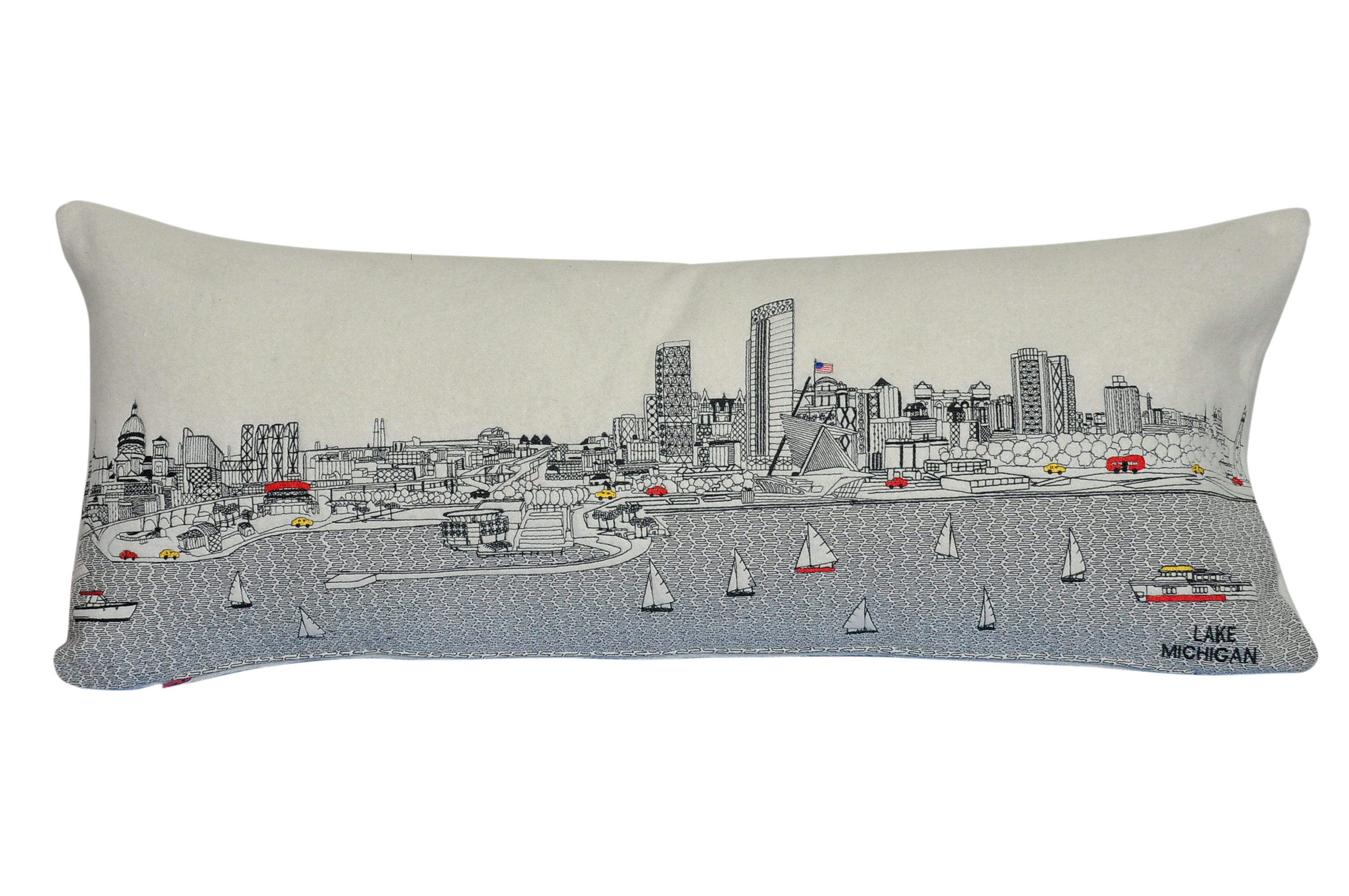 Milwaukee Pillow featuring embroidered graphics of iconic Milwaukee attractions with a red zipper at the bottom.