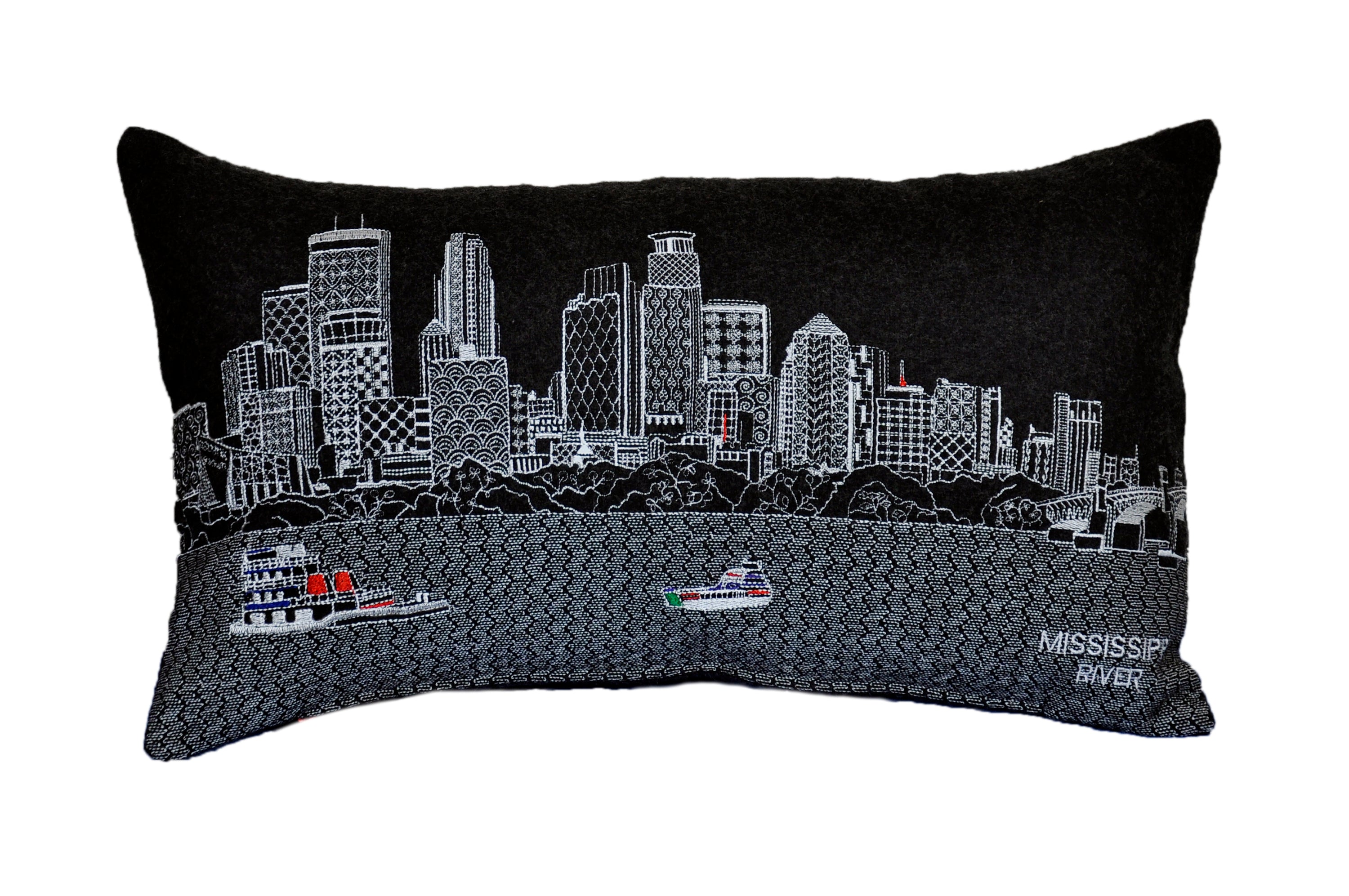 Minneapolis Pillow featuring embroidered landmarks like Foshay Tower and US Bank Stadium, with a red zipper at the bottom.