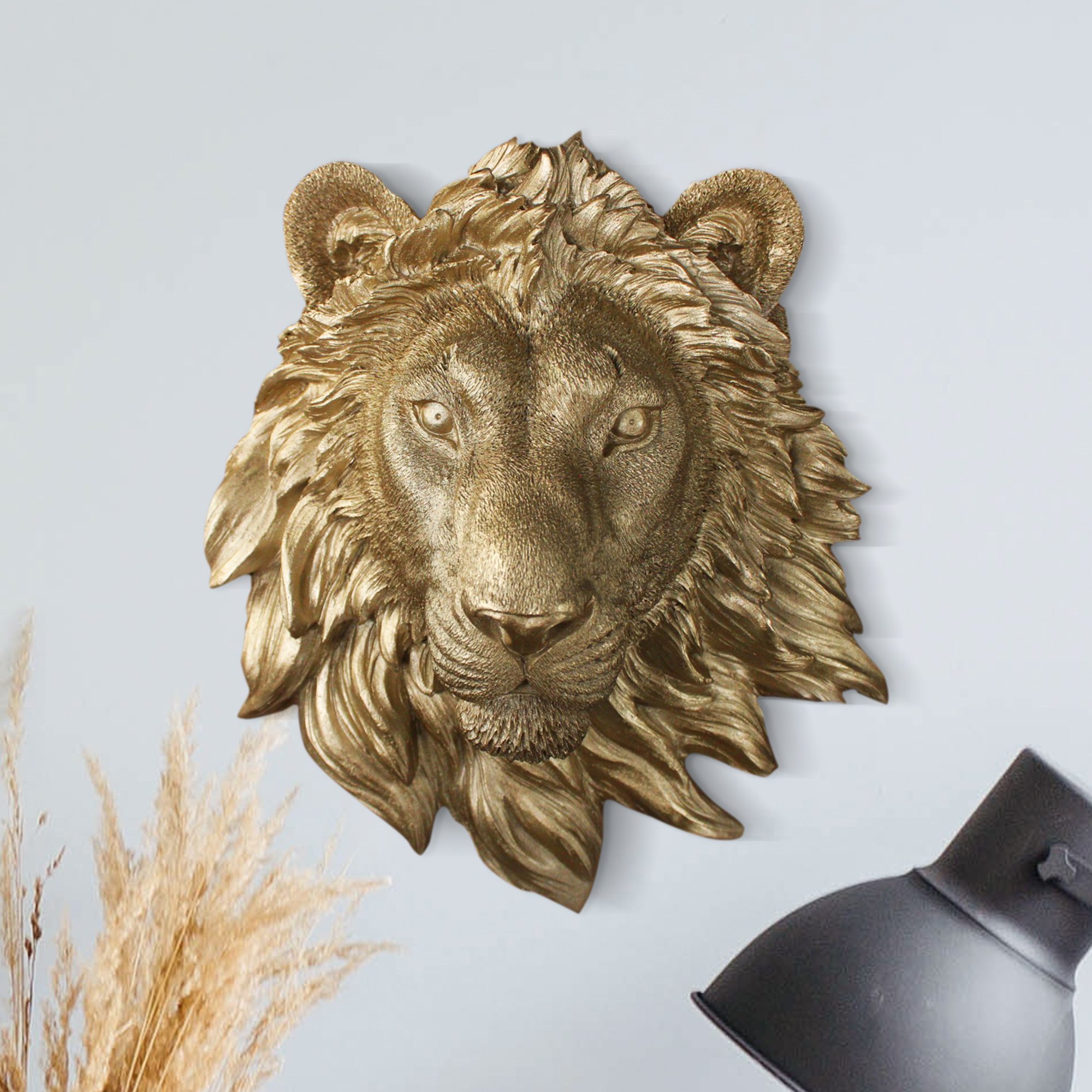 A beautifully hand-painted Mini Gold Lion, 9 inches tall, made from eco-friendly resin, showcasing intricate details and a chic design.