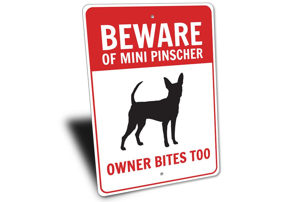 A decorative Mini Pinscher sign made of aluminum, showcasing a charming design perfect for home decor.