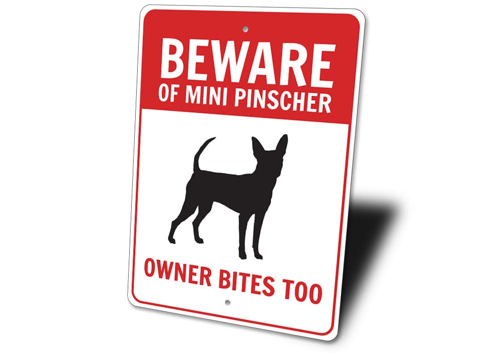 A decorative Mini Pinscher sign made of aluminum, showcasing a charming design perfect for home decor.