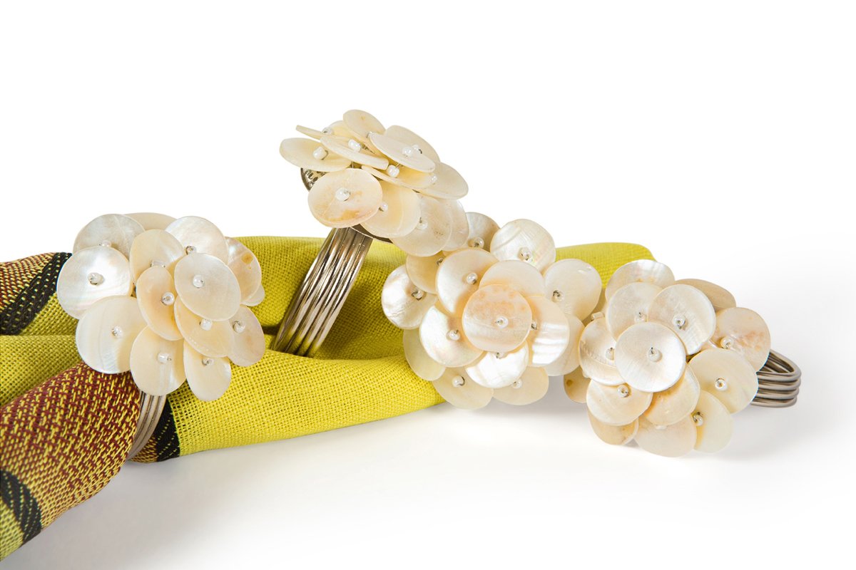 Set of four ML15822 Mother of Pearl Flower Napkin Rings featuring elegant floral inlay on durable metal.