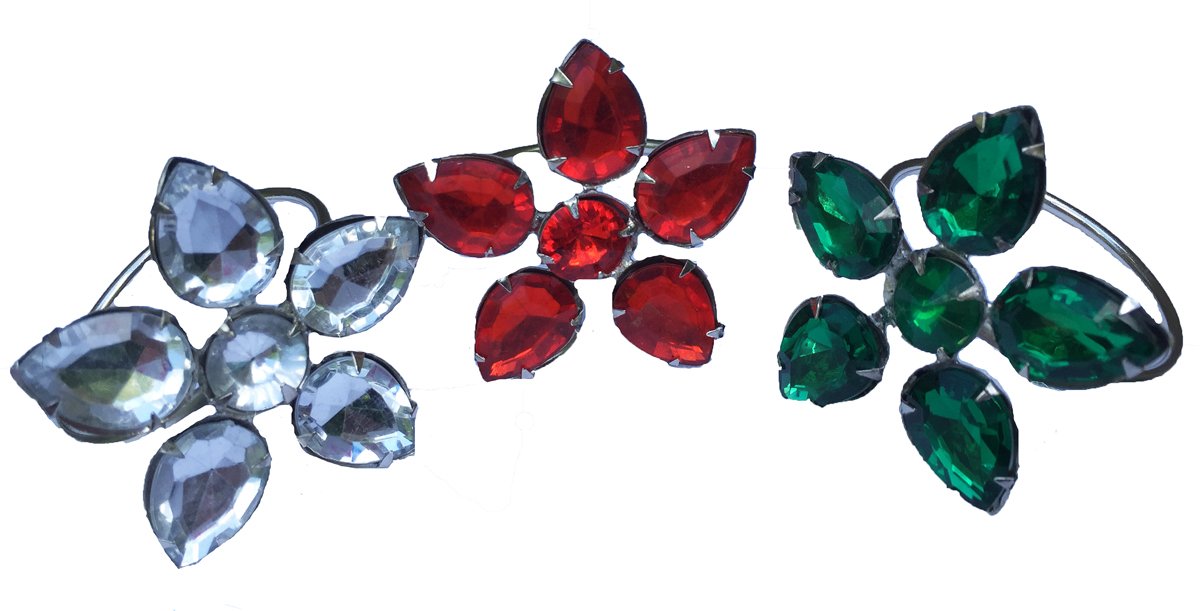 A set of four ML15843 Crystal Flower Napkin Rings featuring colorful glass petals on durable brass rings, perfect for elegant table settings.