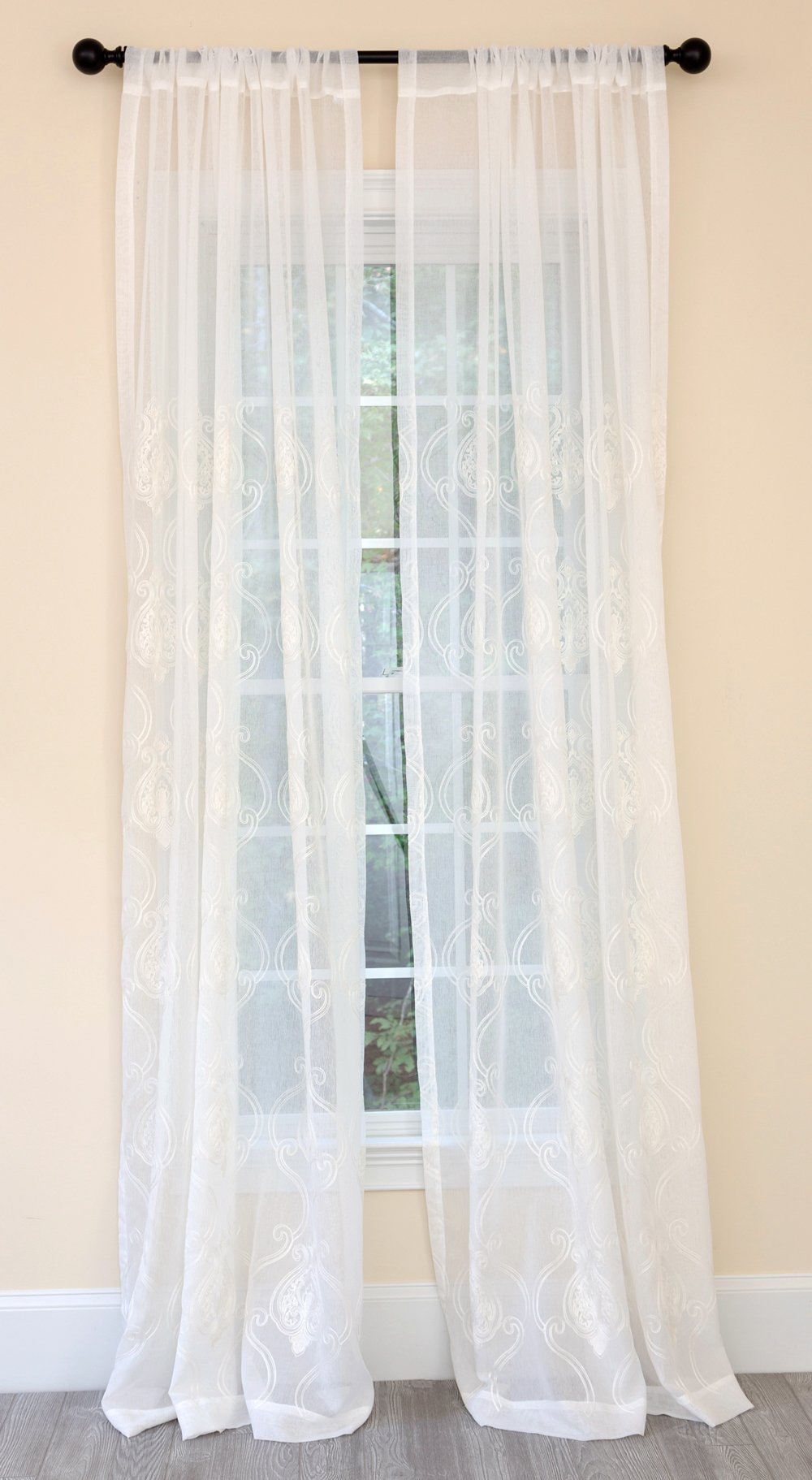 ML16229 Ella Embroidered Sheer Curtain featuring elegant patterns on a lightweight white sheer fabric, enhancing window decor.