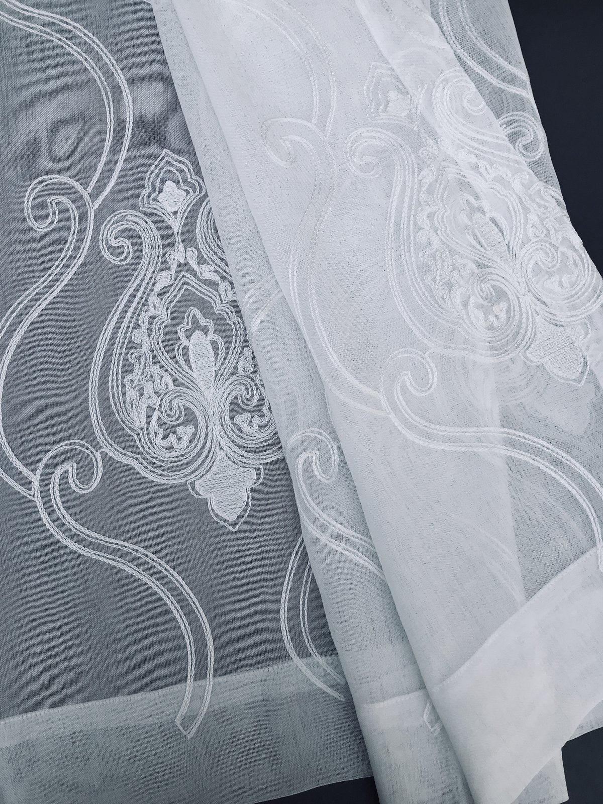 ML16229 Ella Embroidered Sheer Curtain featuring elegant patterns on a lightweight white sheer fabric, enhancing window decor.