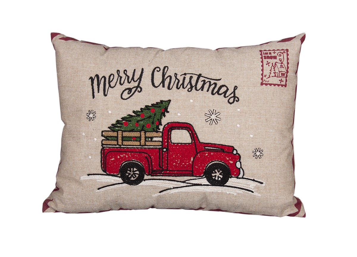 A decorative Christmas pillow featuring a whimsical red pick-up truck design, perfect for holiday decor.