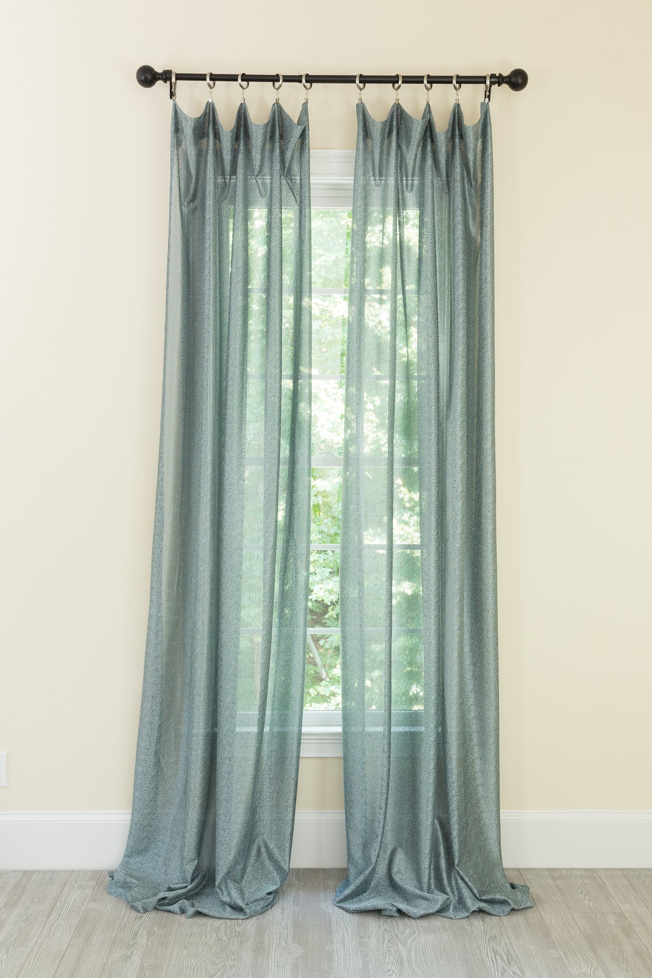 ML18208 La Rosa Curtain in vibrant colors, showcasing its semi-sheer fabric and rod pocket design, perfect for home decor.