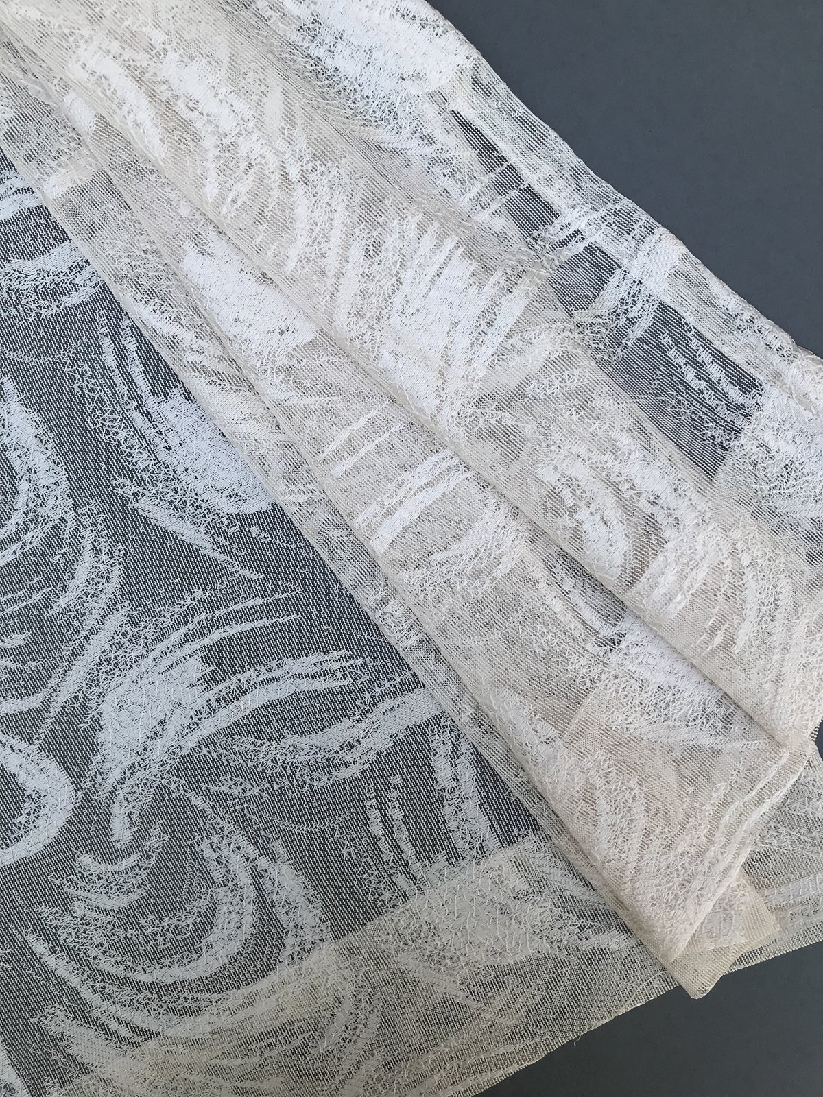 ML19075 Charming Night Sheer Curtain in White with elegant embroidered patterns, showcasing a lightweight and airy design.