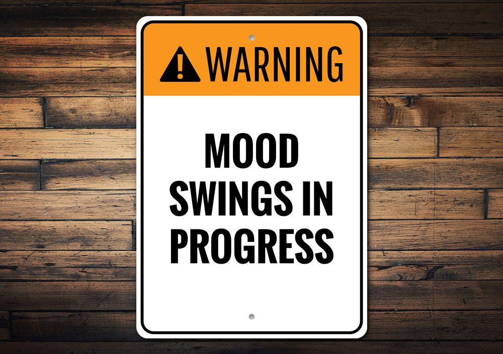 Mood Swings Sign made of high-quality aluminum, featuring customizable text and pre-drilled holes for easy mounting, perfect for home decor.