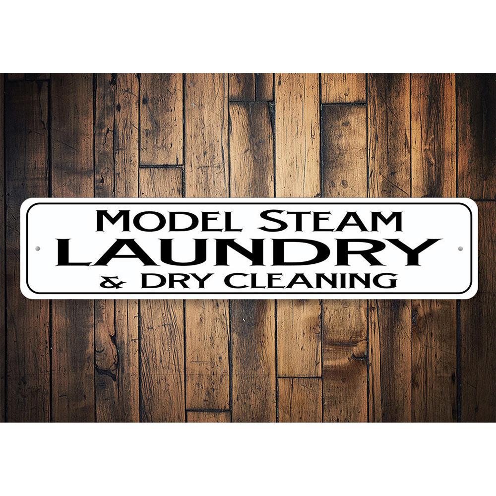 Model Steam Laundry Sign made of high-quality aluminum, featuring a vintage design perfect for decorative purposes in various establishments.