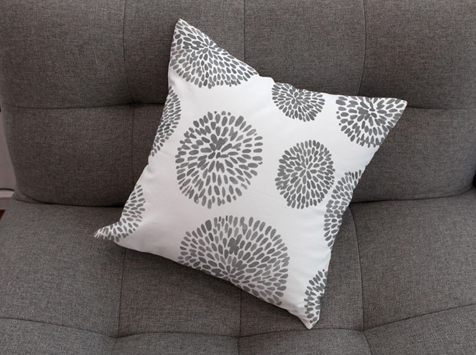 Modern Dandelion cushion featuring a double-sided design in high-quality microfibre, perfect for home decor.