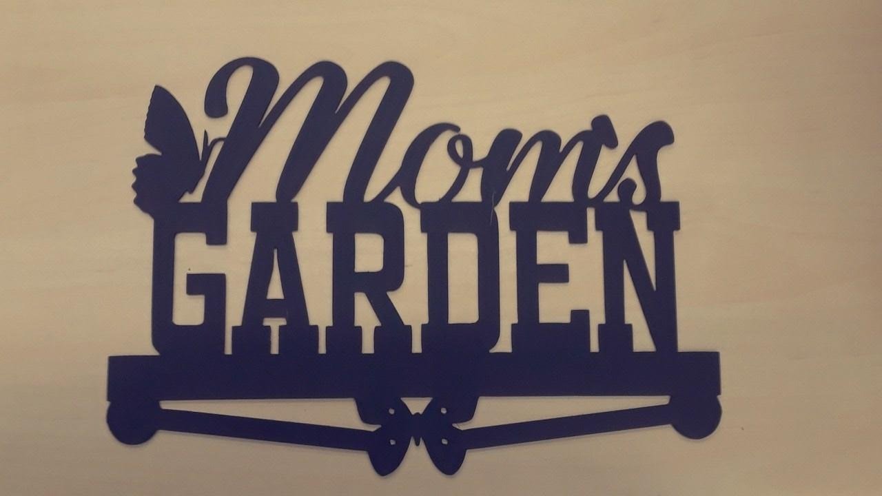 Mom's Garden metal wall art in powder-coated black, featuring intricate design, perfect for home decor.