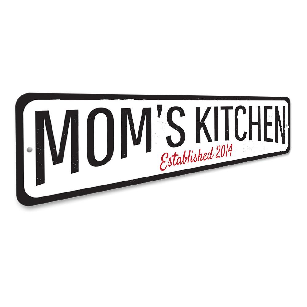 A personalized Mom's Kitchen Established Sign made of high-quality aluminum, featuring custom text and a decorative design, perfect for kitchen decor.