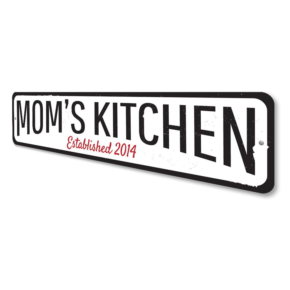 A personalized Mom's Kitchen Established Sign made of high-quality aluminum, featuring custom text and a decorative design, perfect for kitchen decor.