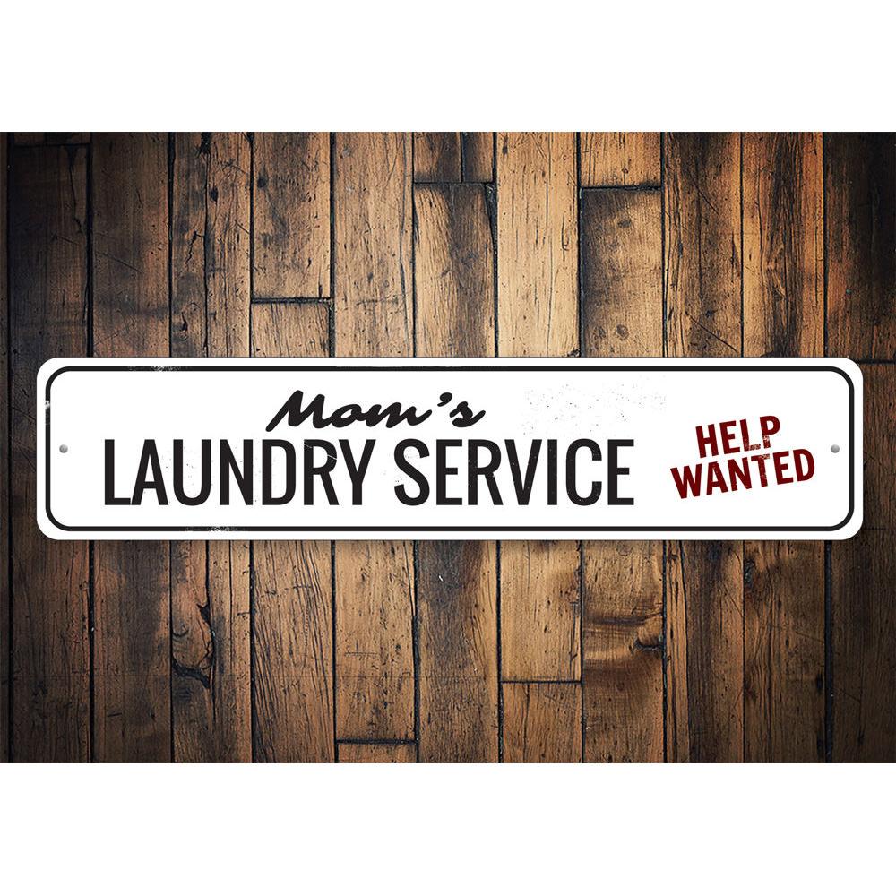 Mom's Laundry Service Sign made of durable aluminum, featuring customizable text and pre-drilled holes for easy mounting.