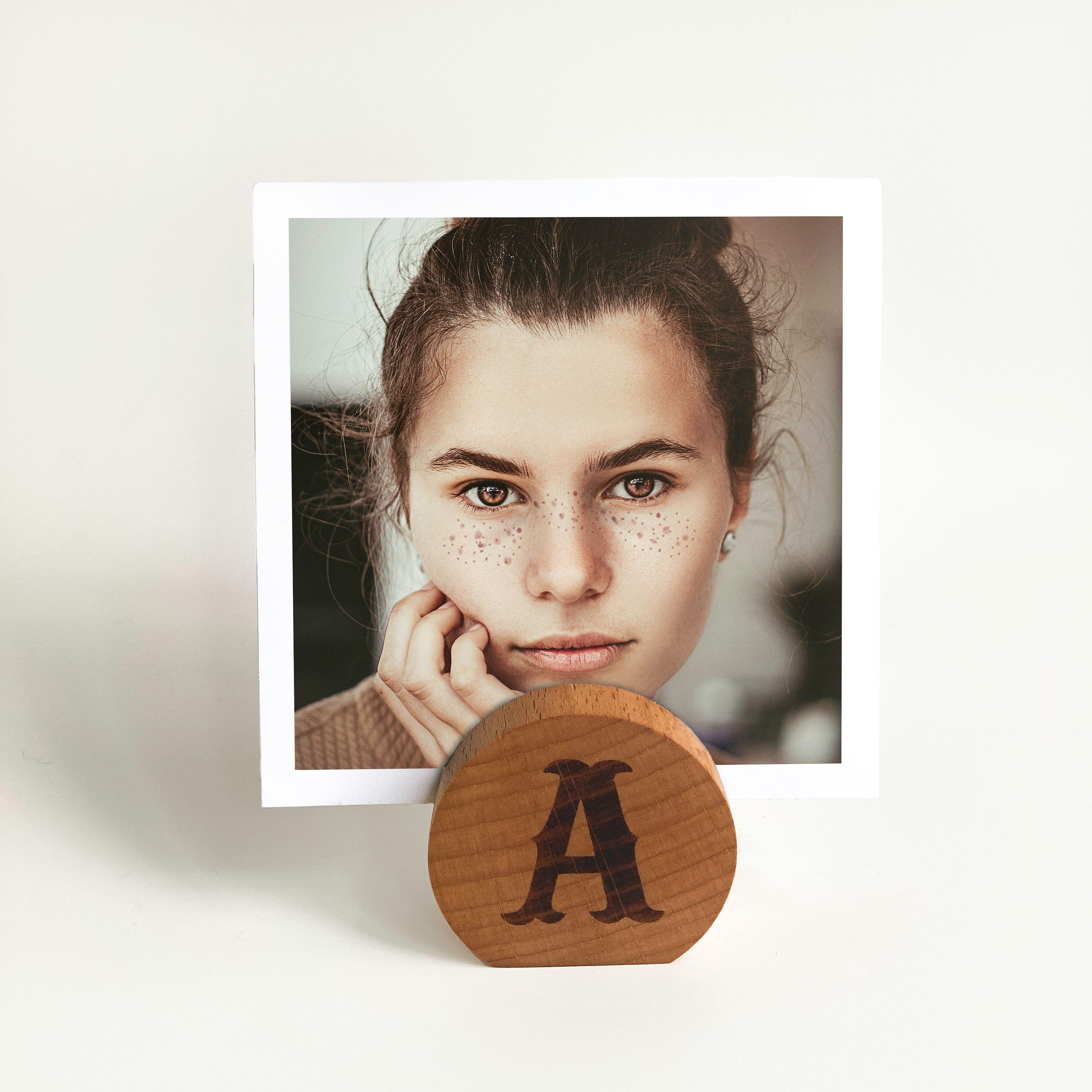 Handcrafted Monogram Moon Photo Holder made from eco-friendly wood, showcasing a small photo in a stylish moon shape.