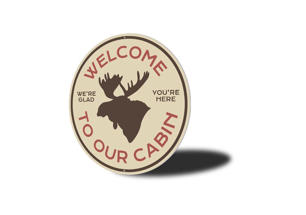 Moose Cabin Welcome Sign made of high-quality aluminum, featuring a rustic design perfect for lakehouse decor.