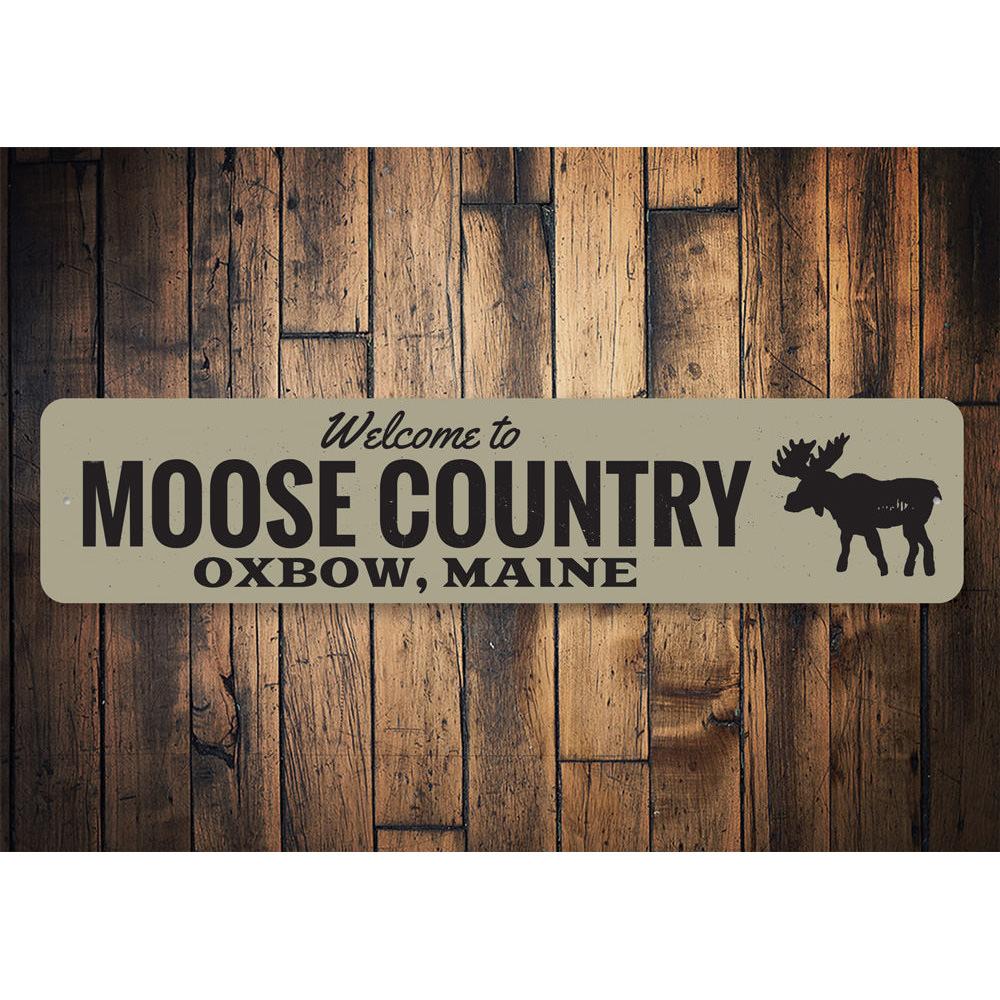 Moose Country Sign made of high-quality aluminum, featuring a rustic design perfect for lakehouse decor.