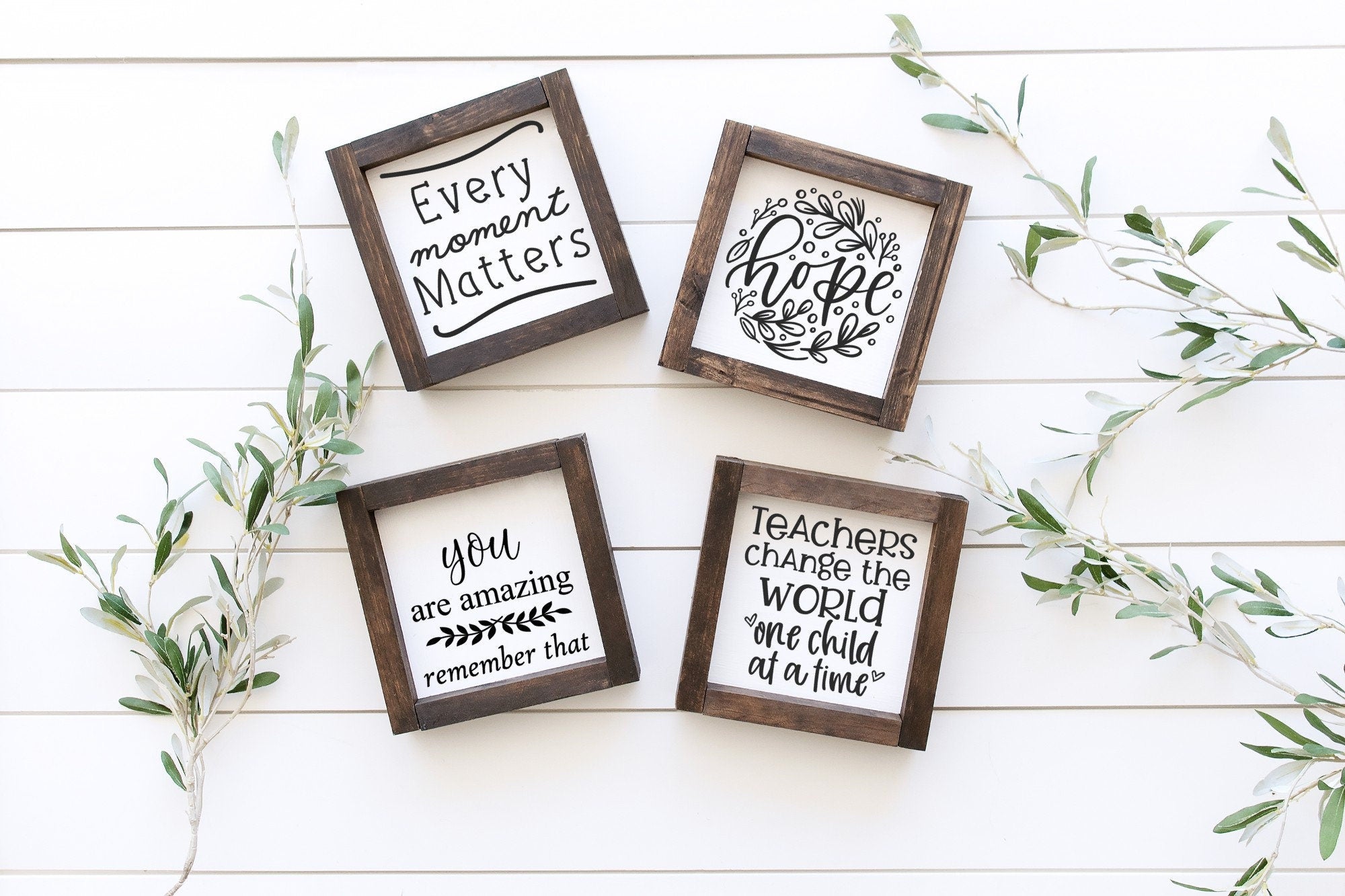 Handmade motivational wood sign with white background and inspirational lettering, available in two sizes.