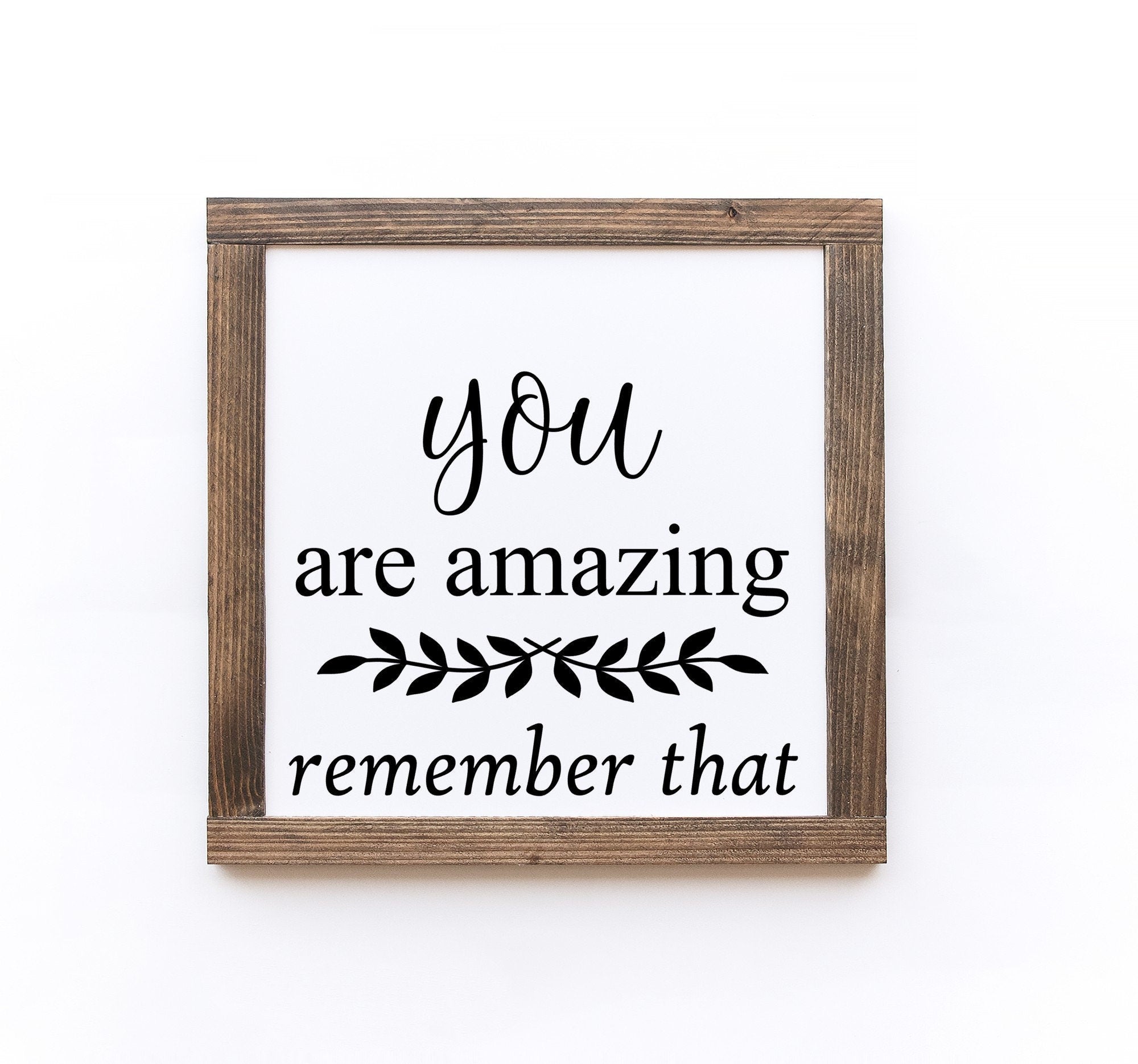 Handmade motivational wood sign with white background and inspirational lettering, available in two sizes.