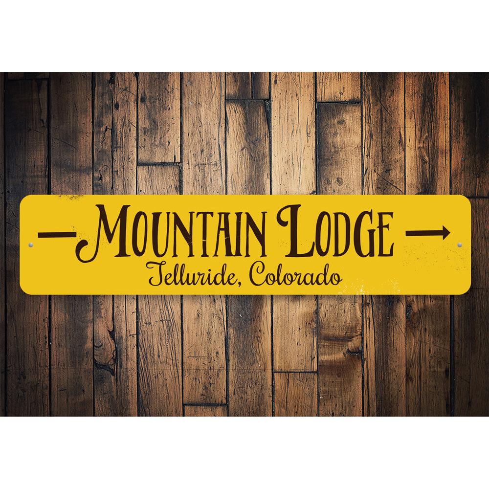 Mountain Lodge Arrow Sign made of high-quality aluminum, featuring customizable text and pre-drilled holes for easy mounting.