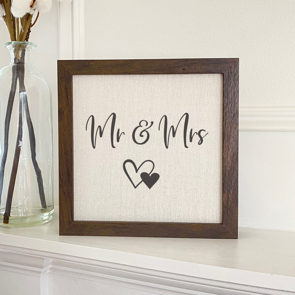 Mr & Mrs Framed Sign with a stylish wood frame and linen-look background, perfect for home decor.