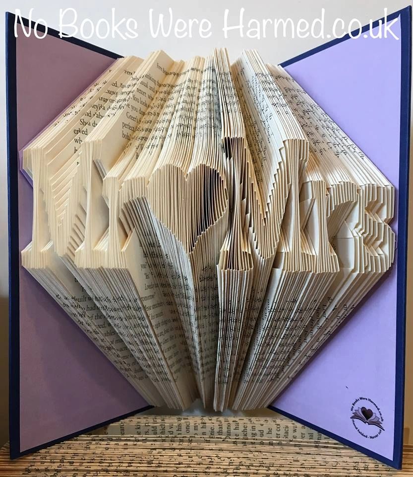 Hand-folded book art featuring 'Mr ♥ Mrs' design, crafted from vintage books, perfect for weddings and anniversaries.