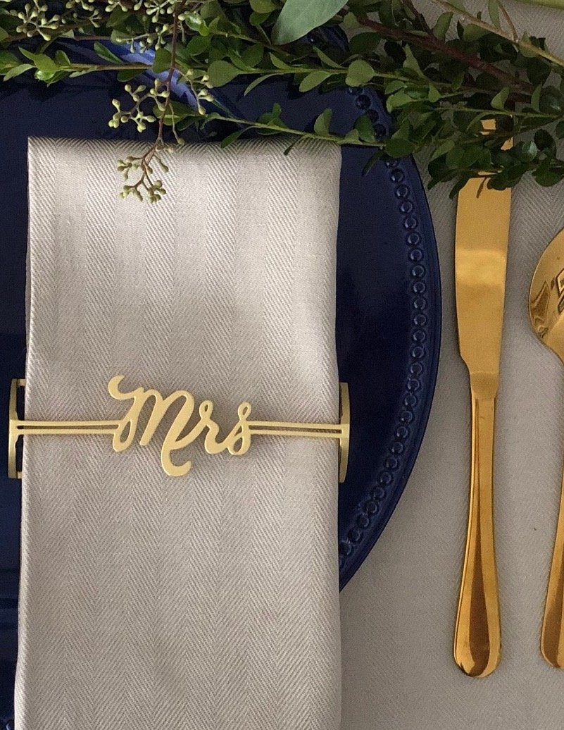 Elegant matte gold Mrs. and Mrs. napkin wraps displayed in a stylish box, perfect for weddings and special occasions.