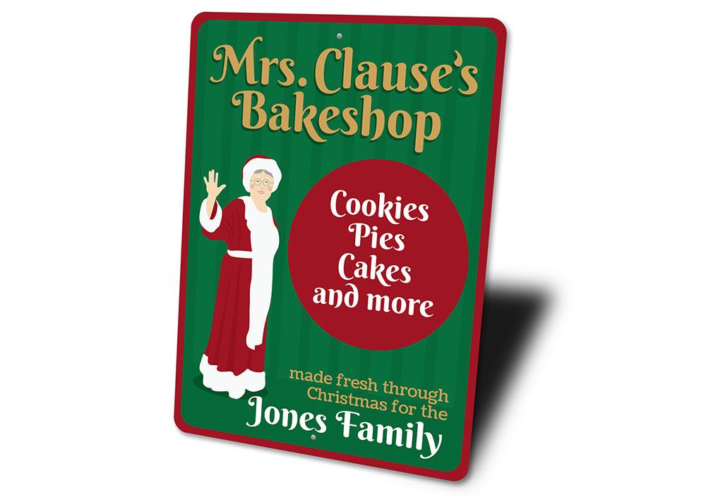 Mrs. Clause's Bakeshop Sign featuring festive holiday design, made from high-quality aluminum with pre-drilled holes for easy mounting.