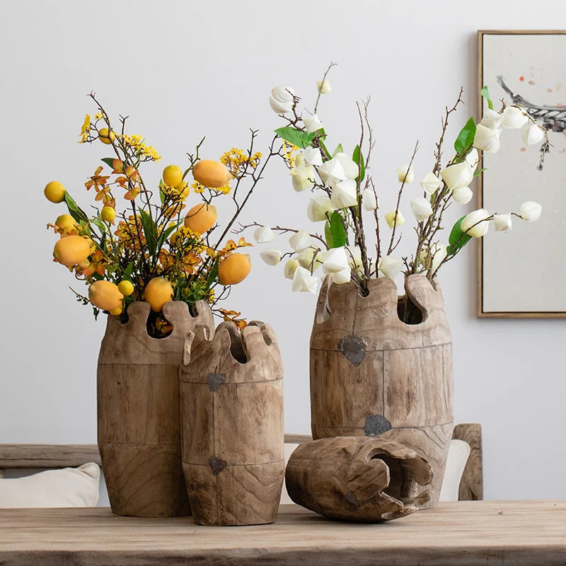 Elegant Mule Vase showcasing Nordic design, handcrafted from wood, available in four sizes.