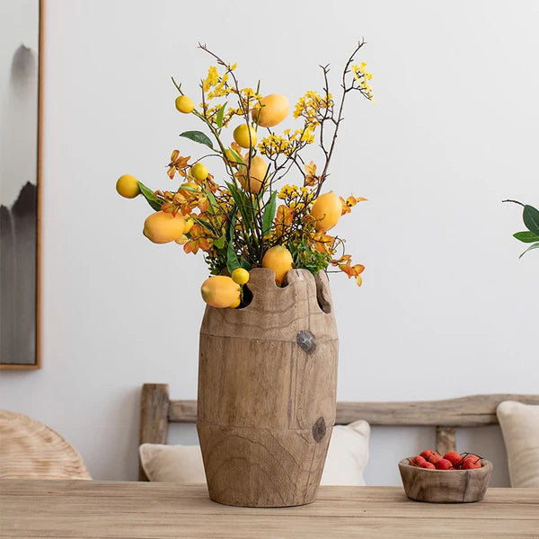 Elegant Mule Vase showcasing Nordic design, handcrafted from wood, available in four sizes.