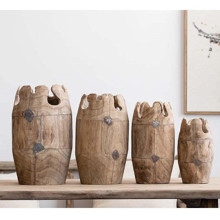 Elegant Mule Vase showcasing Nordic design, handcrafted from wood, available in four sizes.